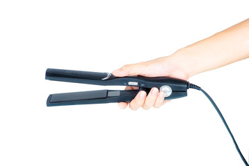 Straightening iron in hand