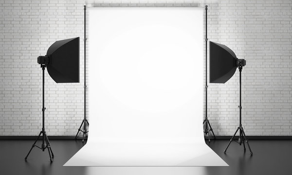 Photo studio equipment on a brick wall background. 3d.