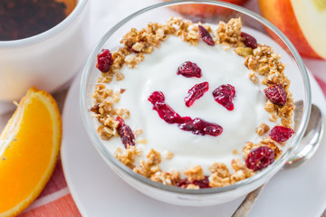 Granola and yogurt with smile face