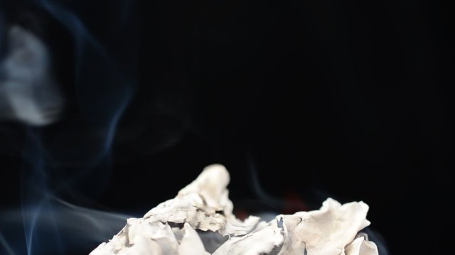 The burning paper