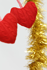 red decoration hanging in heart shape for valentine and christmas