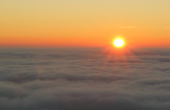Fototapeta Beautiful sunrise over the fog.