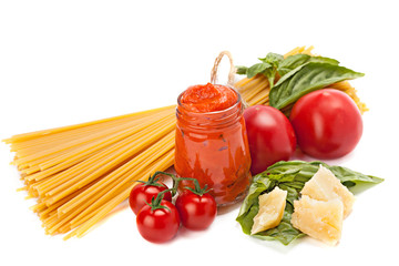 Pasta spaghetti, fresh tomatoes, pieces of Parmesan cheese and t