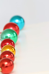 colored Christmas balls lined up