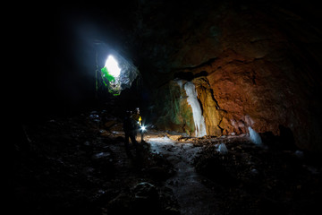 People exploring an amazing Crimean cave