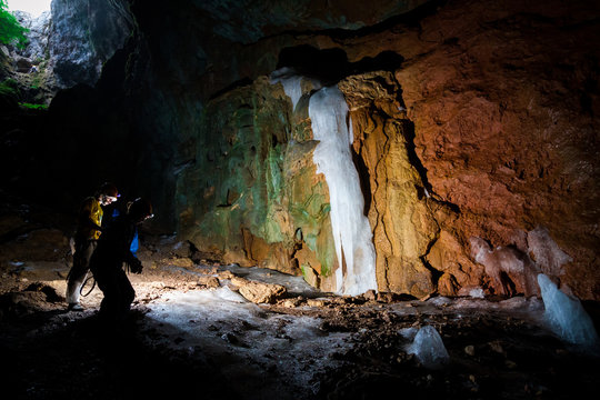 People exploring an amazing Crimean cave