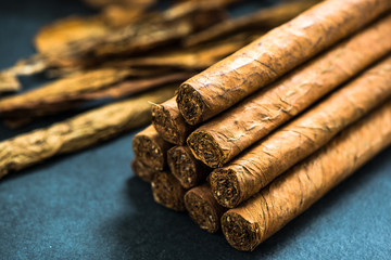 pile of authentic cuban cigars