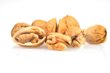 Walnuts in shells isolated on white background
