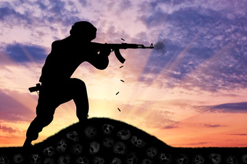 Fototapeta na wymiar Silhouette of man shooting with rifle against cloudy sky
