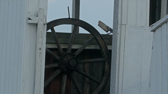 The ship wheelhouse where the captain is inside. It is the deck of the ship where the captain hails the ship