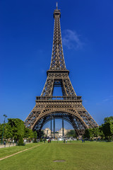 Fototapeta na wymiar Tour Eiffel (Eiffel Tower) located on Champ de Mars in Paris.