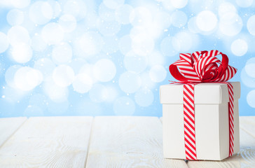 Christmas gift box on wooden table