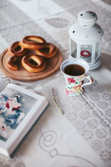 relaxation area with tea, donuts and book