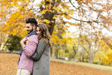 Young couple in the autumn park