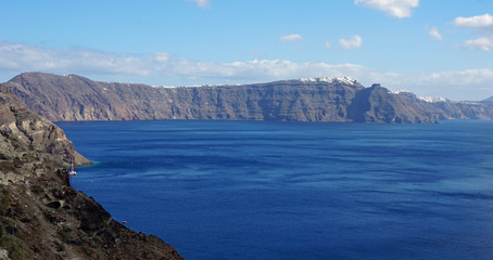 Fototapeta premium view over small oia village on santorini island