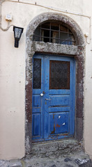 Fototapeta na wymiar colorful door in oia village on santorini island