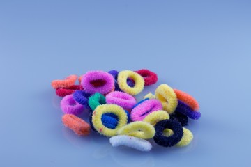 hair scrunchies on blue background
