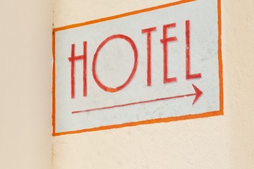 Hotel indicator at the wall in the city