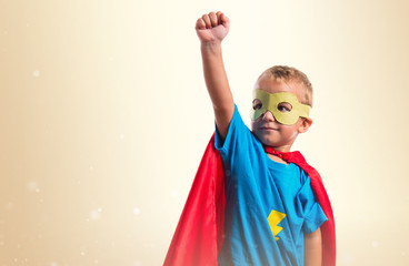 Kid dressed like superhero