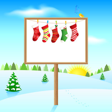 Blank board on sunny winter morning with socks