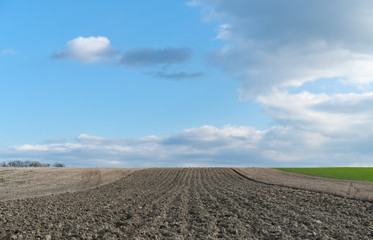 Autumnal plowed field landscape.