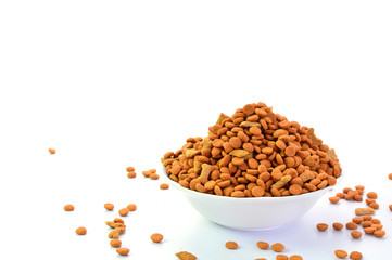 dog food treats in bowl isolated on white background