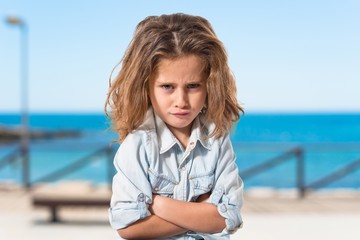 Fototapeta premium Sad blond baby girl