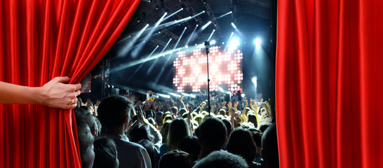 Red curtain on concert stage slightly open
