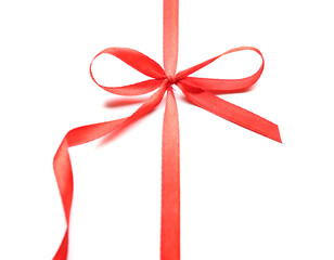 Shiny red ribbon with bow isolated on white