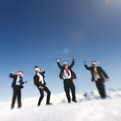 Fototapeta premium Businessmen Celebrating Christmas Snow Mountain Concept