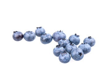Fresh picked blueberries on white background