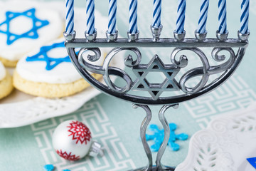 Hanukkah table decoration with menorah.