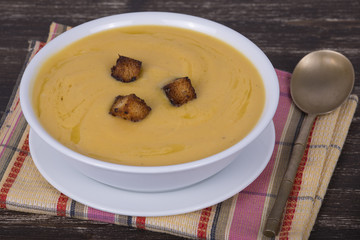 Apple pumpkin cream soup in a dish