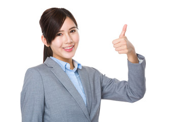 Businesswoman showing thumb up gesture