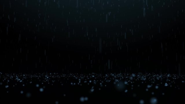 Rain and bouncing waterdrops on dark background with beautiful depth of field