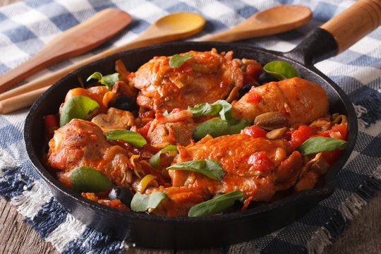 Italian food: chicken with tomato and vegetables. horizontal

