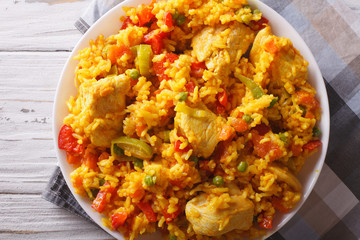Rice with chicken and vegetables closeup. horizontal top view
