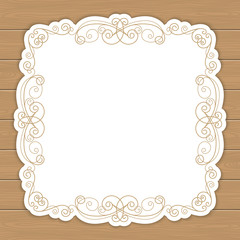 Wood background with curly frame