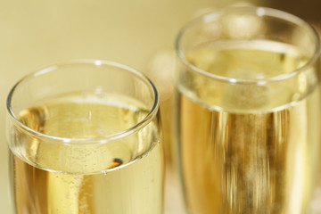 Two champagne glasses with gift boxes