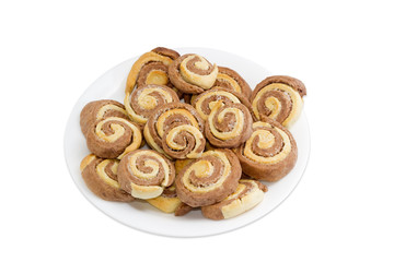 Two coloured sweet roll on white dish
