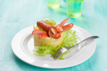 Sausage dragonfly with mashed potato