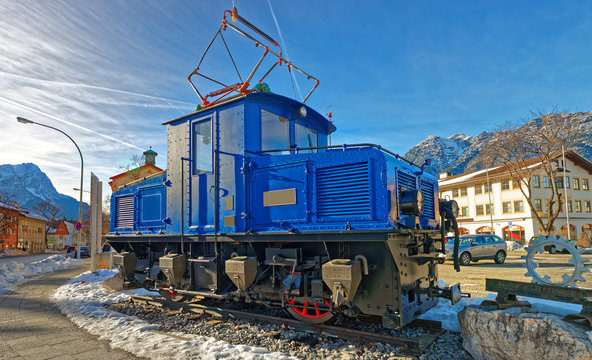 Vintage steam engine locomotive train in the street of Garmisch-Partenkirchen