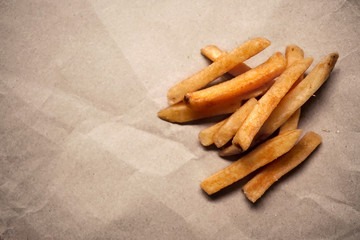 french fries on craft paper background
