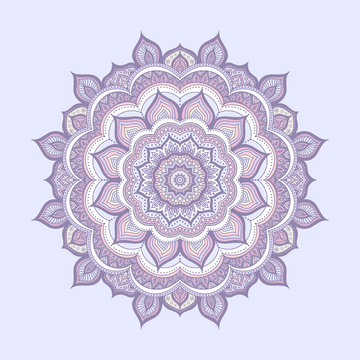 Vector hand drawn doodle mandala. Ethnic mandala with colorful ornament. Isolated. Light yellow, pink, blue, and white colors.