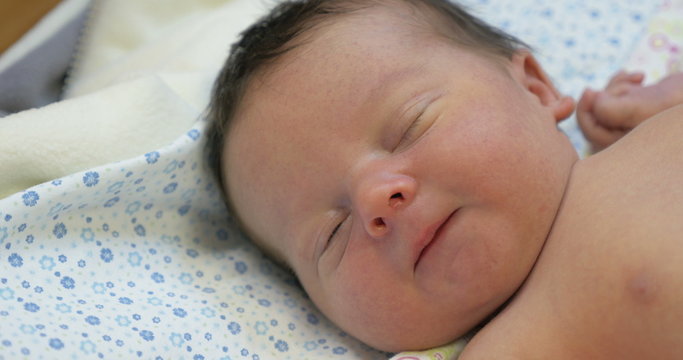 Newborn Baby Awaking from the Dream
