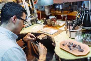 Goldsmith working on his bench