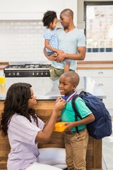 Smiling young boy going to school