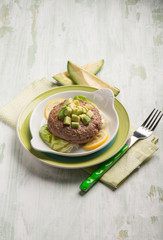 healthy hamburger with avocado and lettuce salad