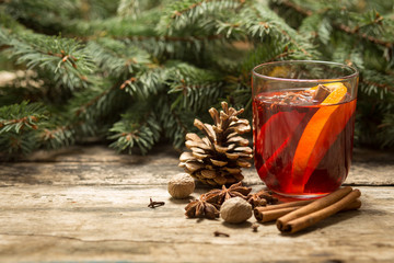 Christmas alcoholic drink on wooden background