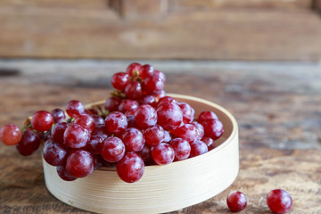 Grapes on wooden